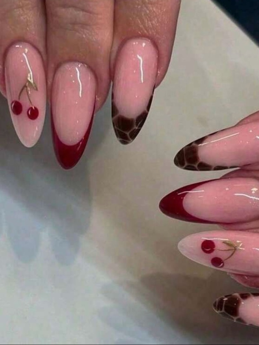 Cherry Accent Almond Nails in Blush Pink, Deep Red & Brown